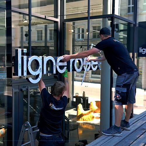 Storefront sign installation in Scarborough